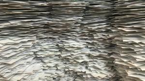 Massive, messy stack of blank white paper