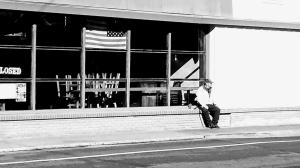 Man sitting outside cafe