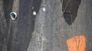 grey wall with orange blaze